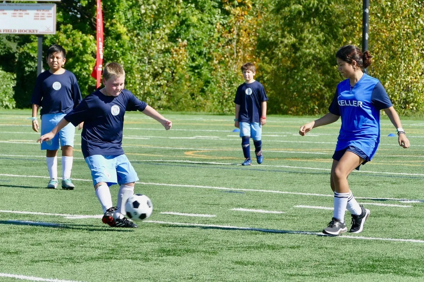 Diverse City FC athletes playing soccer together